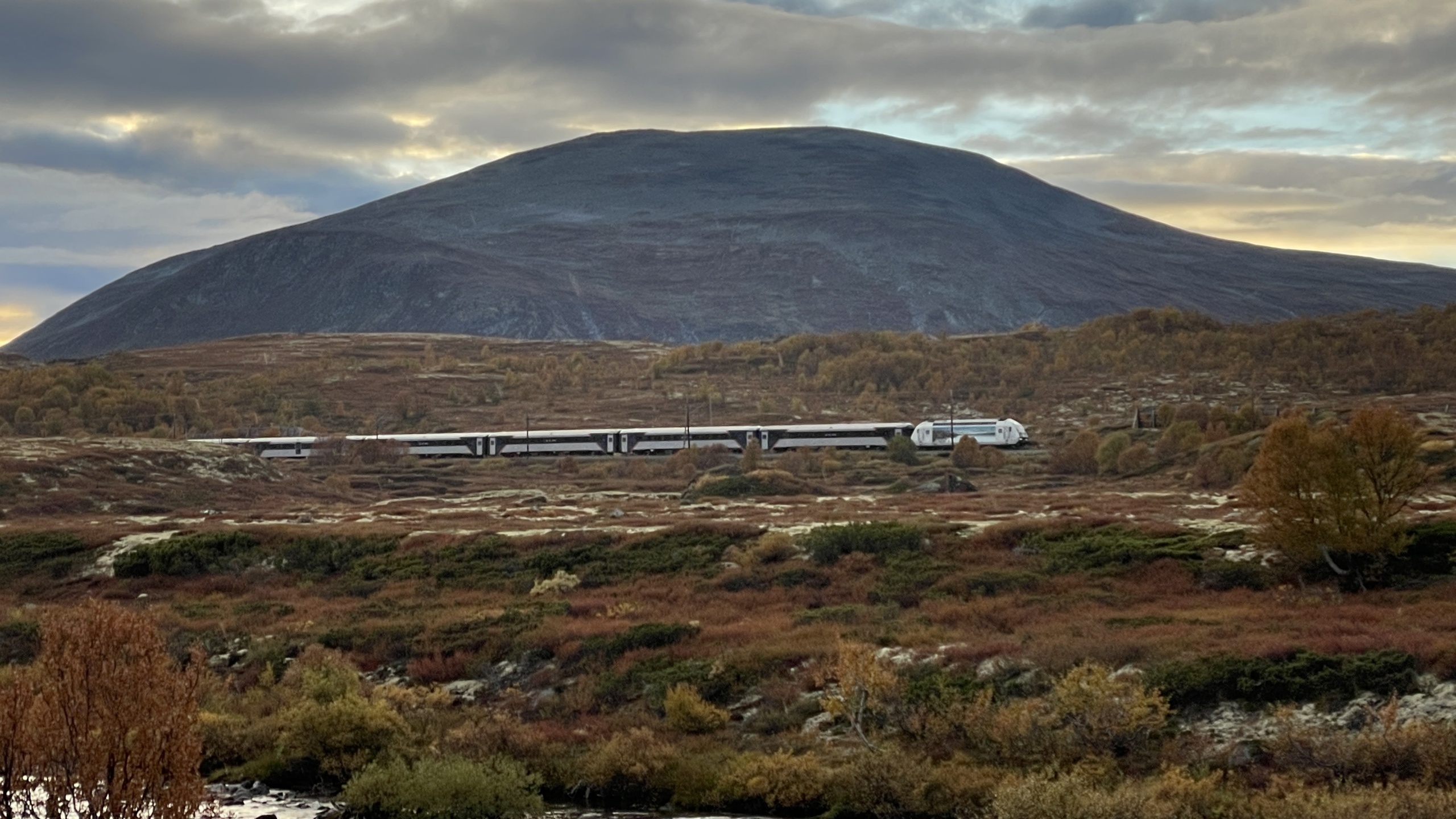 Electric train travelling through the Dovre mountains.